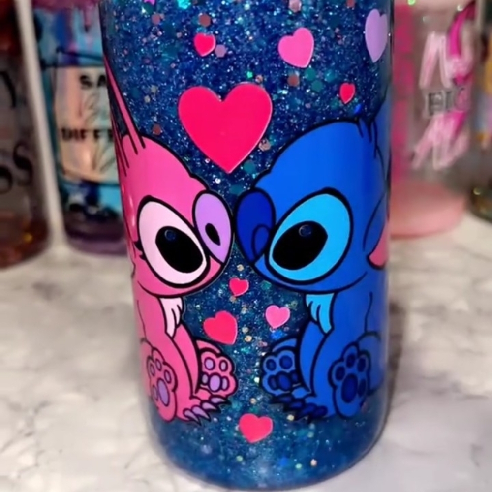 Glittery Blue Tumbler with Pink and Blue Cartoon Design